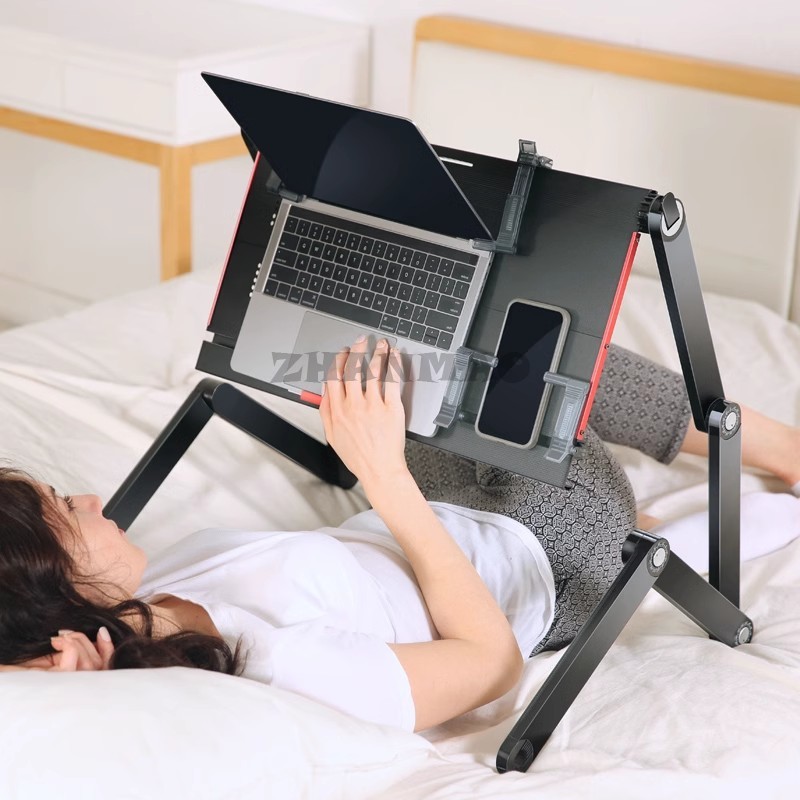 Liggend plat op het bed, lapto - Desk Setup Ideas recensie en prijs